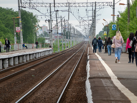 MOSCOW, RUSSIA - JULY 13, 2018: Russian Railways high-speed train Lastochka Swallow rides along the railway path.