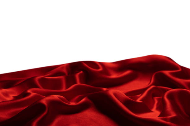 istock Red silk or satin luxury fabric texture isolated on a white background. 1479725996