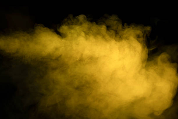 istock Yellow steam on a black background. 1479726005