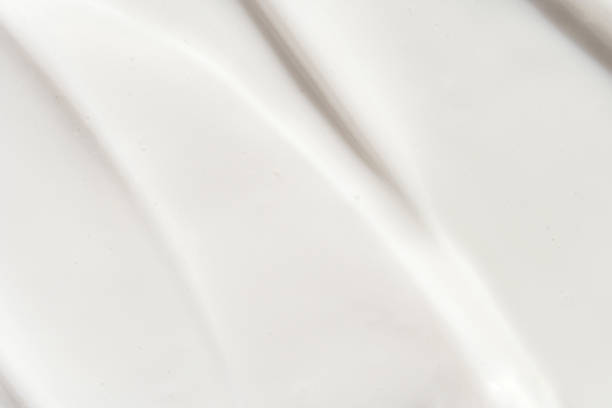 istock Cosmetic product background. White toothpaste texture. Cream 1479727404