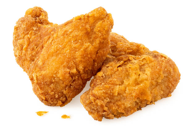 istock Two crispy fried chicken wings isolated on white. 1479728197