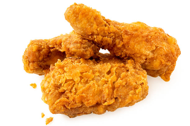 istock Crispy fried chicken pieces, drumstick, wing and thigh, isolated on white. 1479728546