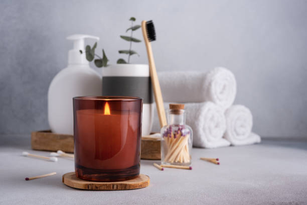 istock Spa composition with burning candle and bathroom accessories 1479734936