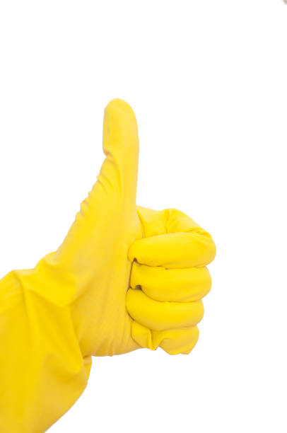 istock yellow rubber gloves on white background sign 1479736261