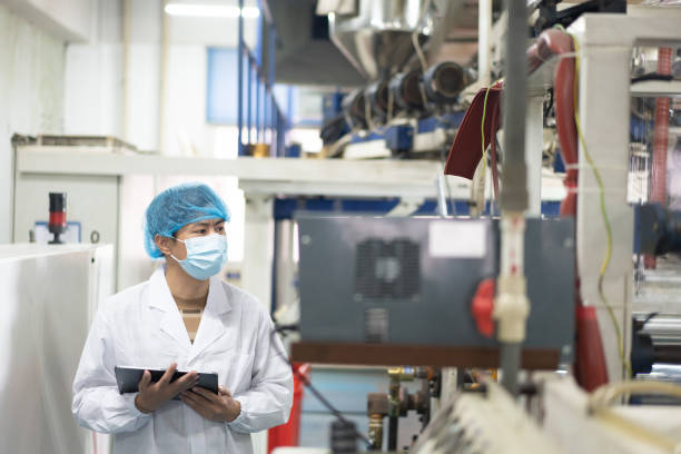 istock Asian workers are automating production equipment 1479736936