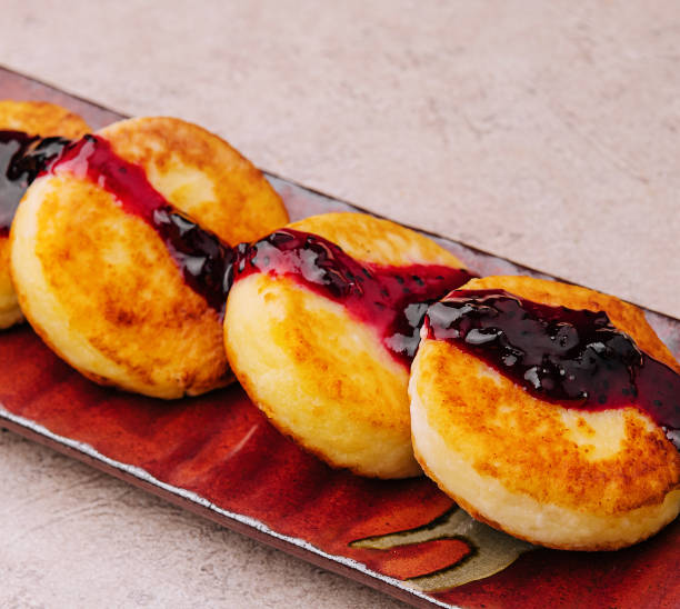 istock Fritters of cottage cheese with blueberries jam 1479737002