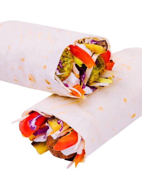 Appetizing shawarma with falafel isolated on white