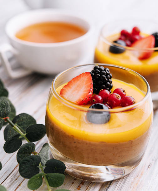 istock Delicious panna cotta with mango with berries 1479737501