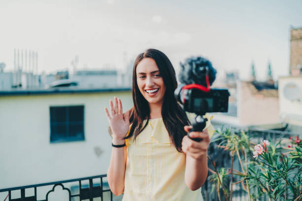 istock Smiling woman vlogging from Budapest 1479737703