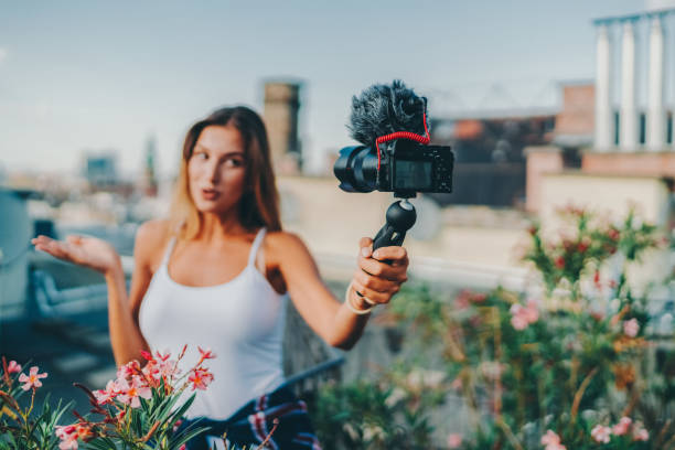 istock Smiling woman vlogging from Budapest 1479738340