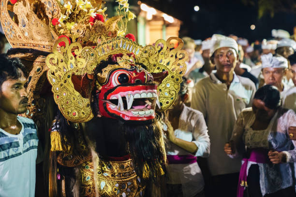 Bali, Indonesia - January 14, 2023: Balinese Barong ritual dance during open air ceremony at Nusa Lembongan, Bali, Indonesia.