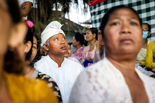 Bali, Indonesia - January 14, 20123: Balinese man participates in a street ceremony, during a traditional Barong dance in Nuse Lembongan Bali, Indonesia