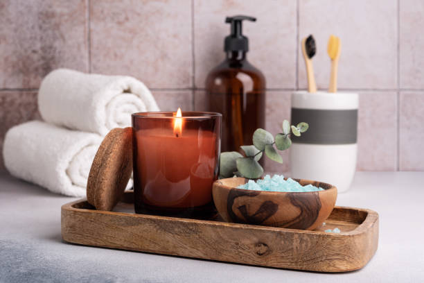istock Scented candle, sea salt and bathroom accessories for relax 1479746715