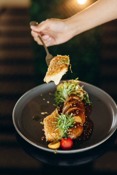 istock Chicken baked in a sauce with cheese strips fried in a deep fryer. 1479747052
