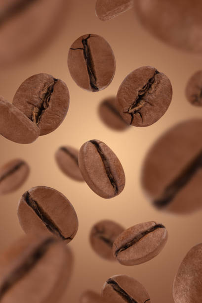 istock Levitation of coffee beans on a brown background. 1479749748
