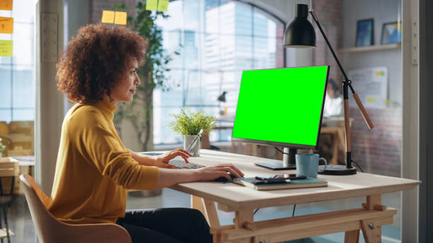 istock Middle Eastern Female Working in Creative Agency, Implementing Modern Business Strategy for Clients. Successful Specialist Using Computer with Green Screen Mock Up Display. 1479753964