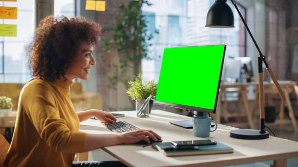 istock Middle Eastern Female Working in Creative Agency, Implementing Modern Business Strategy for Clients. Successful Specialist Using Computer with Green Screen Mock Up Display. 1479754002