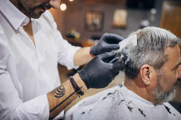 310+ Handsome Barber Trimming Hair Of Old Man Stock Photos, Pictures ...