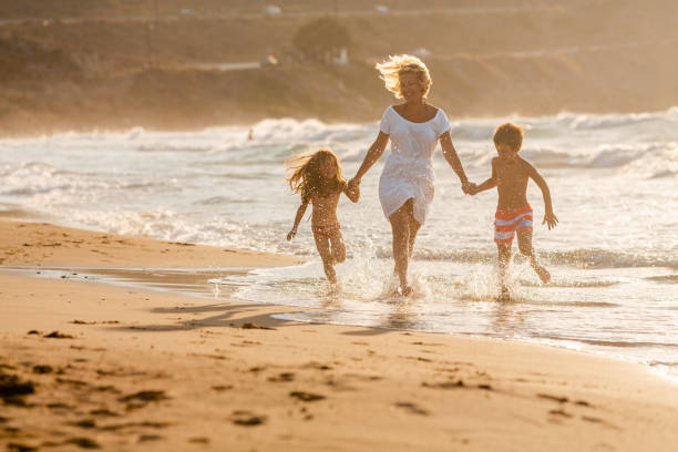 istock Family enjoyble moment on sunset 1479761538