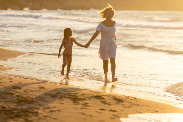 istock Family enjoyble moment on sunset 1479761739
