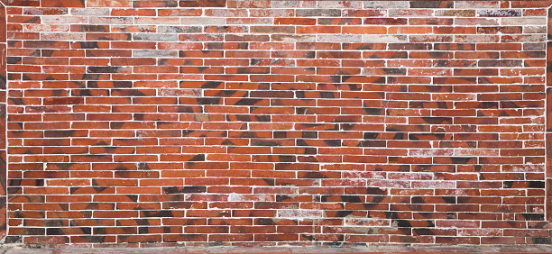 Brick wall grunge background. Suitable for interior design.