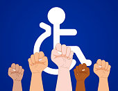 istock Wheelchair, protest, arms up... 1479764194