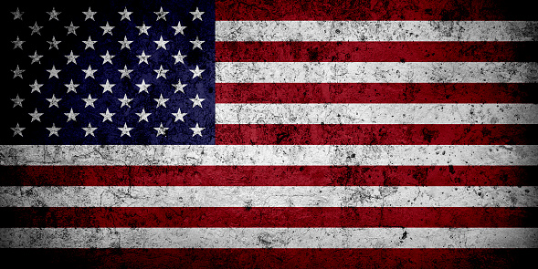 Flag of United States with faded grunge effect and vignette, perfect for backgrounds and design.