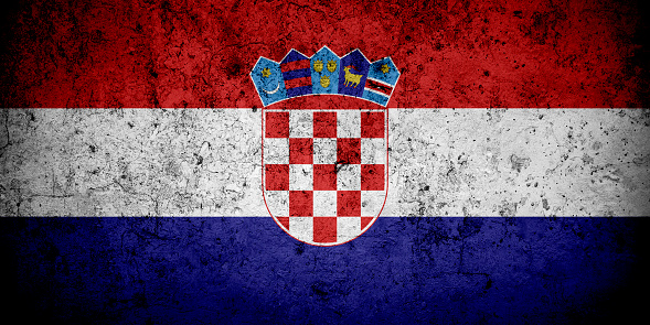Flag of Croatia with faded grunge effect and vignette, perfect for backgrounds and design.