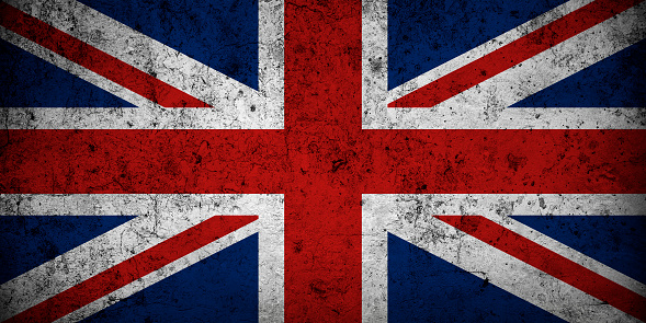 Flag of United Kingdom with faded grunge effect and vignette, perfect for backgrounds and design.
