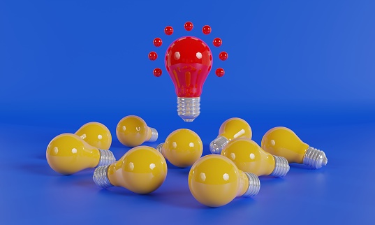 Ideas inspiration concepts with red lightbulb flying on group of another lightbulb, Business start up or goal to success. creativity of human. colorful lightbulb, The idea of a leader.