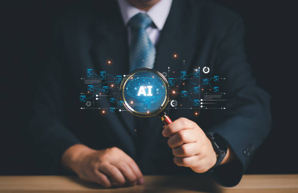 istock Man hand holding magnifying glass AI search engine for data and connection internet global for analysis, information cyberspace, The concept of searching for information in technology with AI system. 1479770733