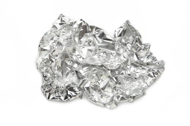 istock Crumpled aluminum foil isolated on white background. 1479771410