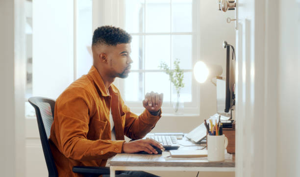 istock Focused business man entrepreneur typing on the computer doing research 1479777662