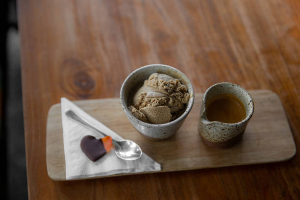 istock Small espresso coffee with vanilla ice cream, heart shaped cookie. 1479778302