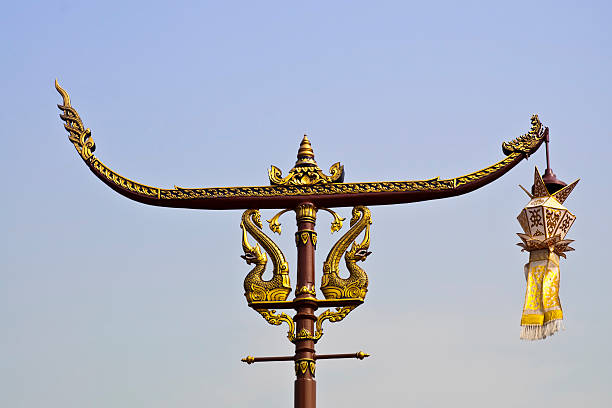 TALLINN, ESTONIA- JUNE 12, 2016: Antique weather vane-cock above the modern Tallinn