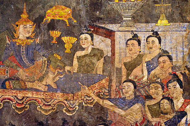 Ancient Thai temple mural background Ancient Buddhist temple mural depicting a Thai daily life scene at Wat Phumin, a famous temple in Nan province, Thailand. The temple is open to the public and has beautiful murals on the walls which were painted by Thai artisans hundreds of years ago. These beautiful ancient murals have deteriorated over the years but there are still some in good condition. painted image paintings oil paint senior women stock pictures, royalty-free photos & images