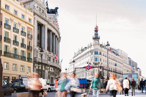 Calle de Alcala and Gran Via Streets at night with Edificio Metropolis Building - Madrid, Spain