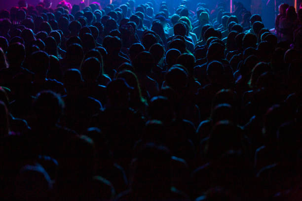 istock Audience listens to rock and roll at the conference hall. 1479783030