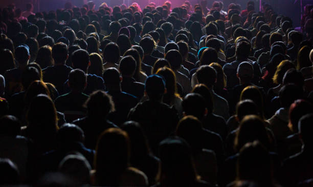 istock Audience listens to rock and roll at the conference hall. 1479783036