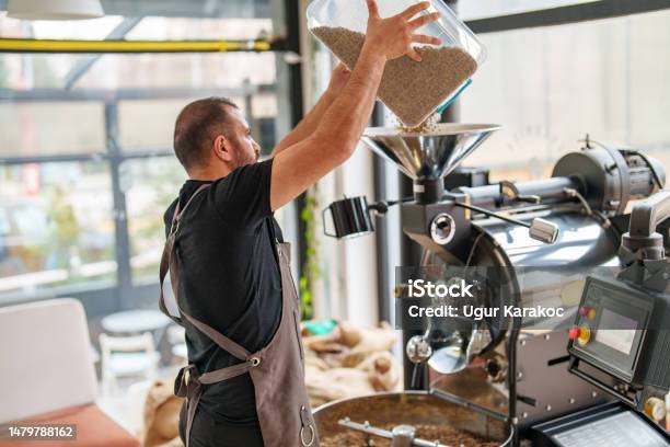 Pouring Raw Coffee Beans To Roasting Machine Stock Photo - Download Image Now - Coffee Roaster, Bean, Coffee Maker
