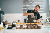 Barista  pouring coffee to cup, Coffee Shop Small Business