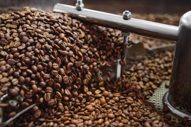 istock Roasted Coffee Beans at the Cooler Part of the Roasting Machine 1479792377