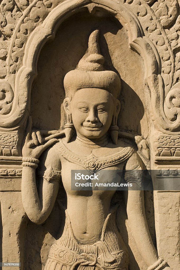 Apsara Carving, Baphuon Tempio, Angkor - Foto stock royalty-free di A petto nudo