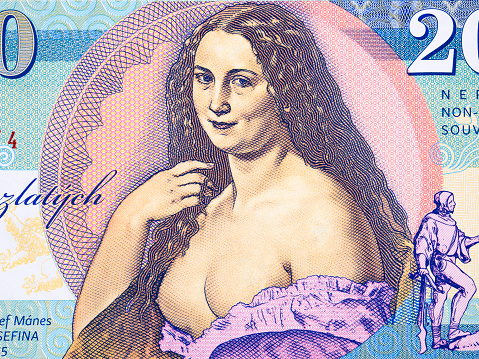 Macro Photo of 20 Bolivares Fuertes bill. Her name is Luisa Caceres de Arismendi and belongs to the new bill collection