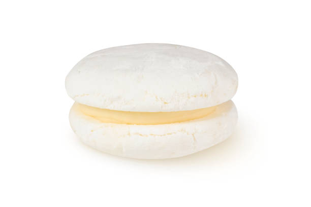 istock Vanilla or coconut macaron on isolated white background 1479805269