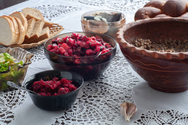istock On the table are kutya in a jug, herring, bread, garlic, salad. 1479806537