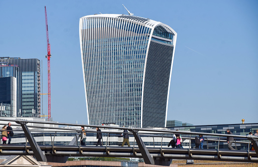 London, UK - April 4 2023: 20 Fenchurch Street, widely known as the Walkie Talkie building, daytime view with a clear blue sky.