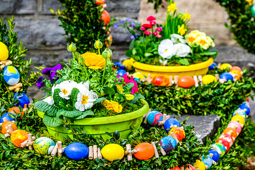 typical bavarian easter decoration at a well - photo
