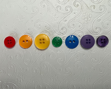 colorful buttons on white