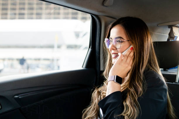 istock Young businesswoman inside a car. 1479820874